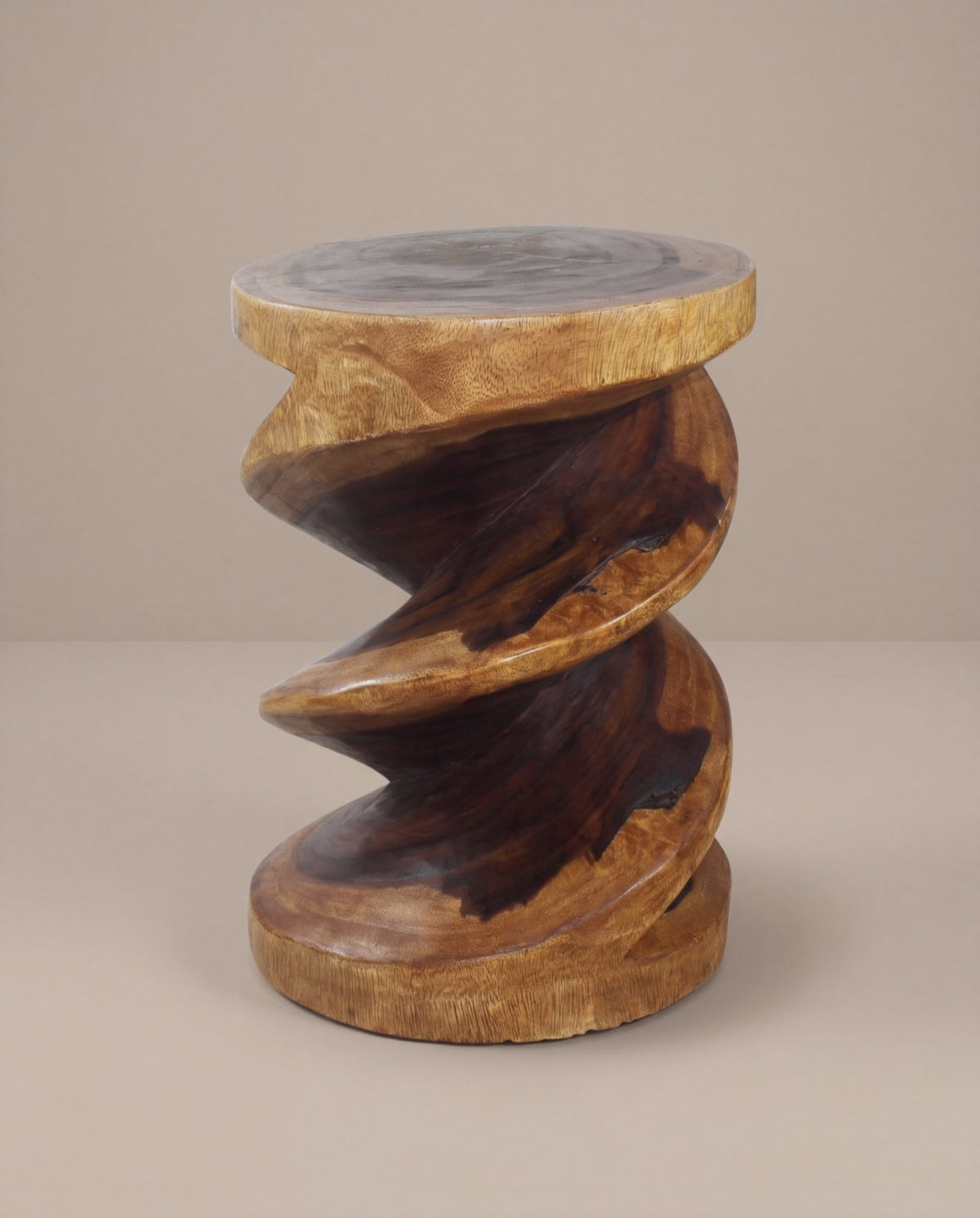 The Atria sculptural walnut accent table in motion